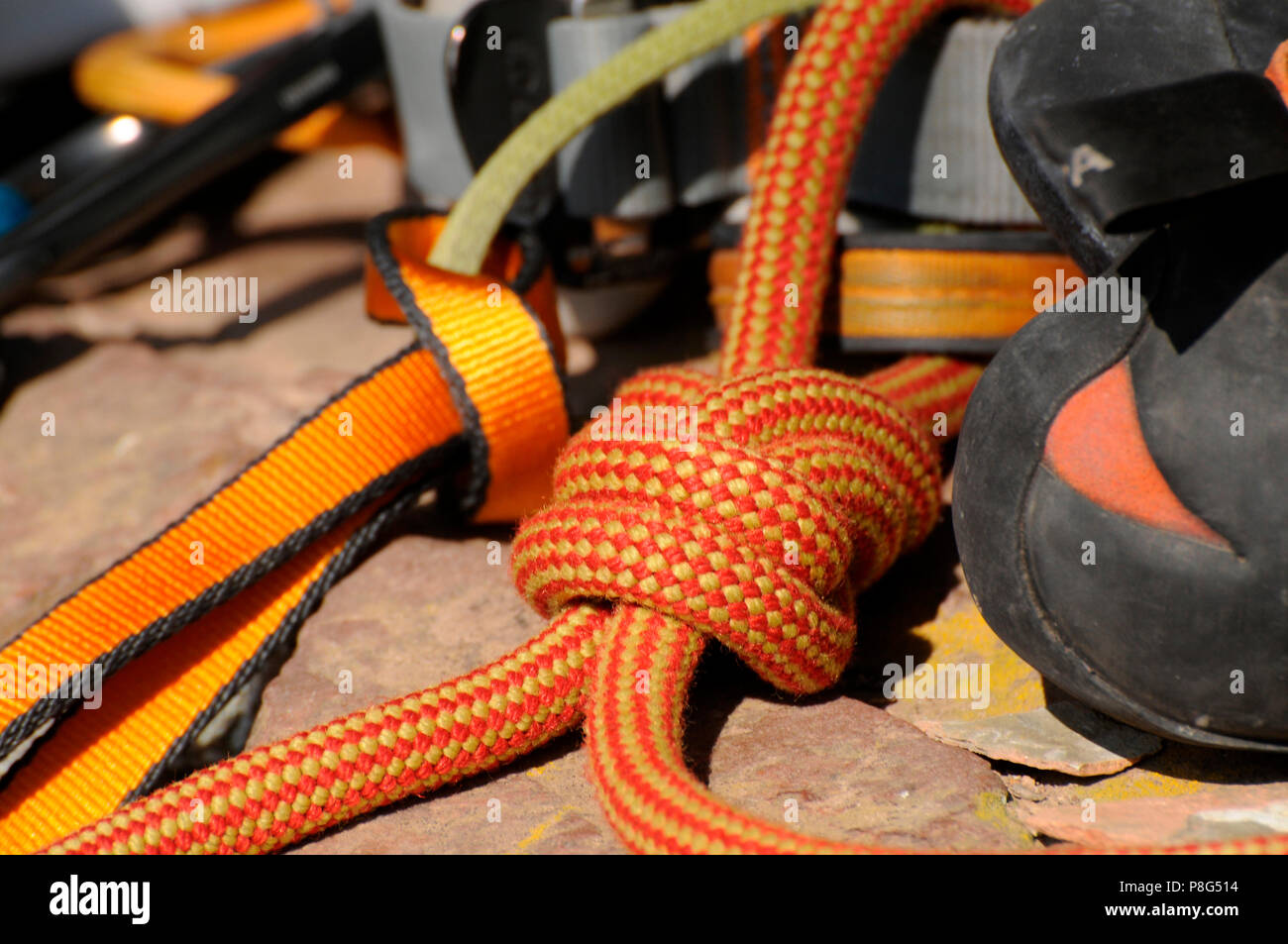 Climbing Equipment, rock climbing, mountaineering, climbing harness, webbing, figure-eight knot, climber's shoes Stock Photo