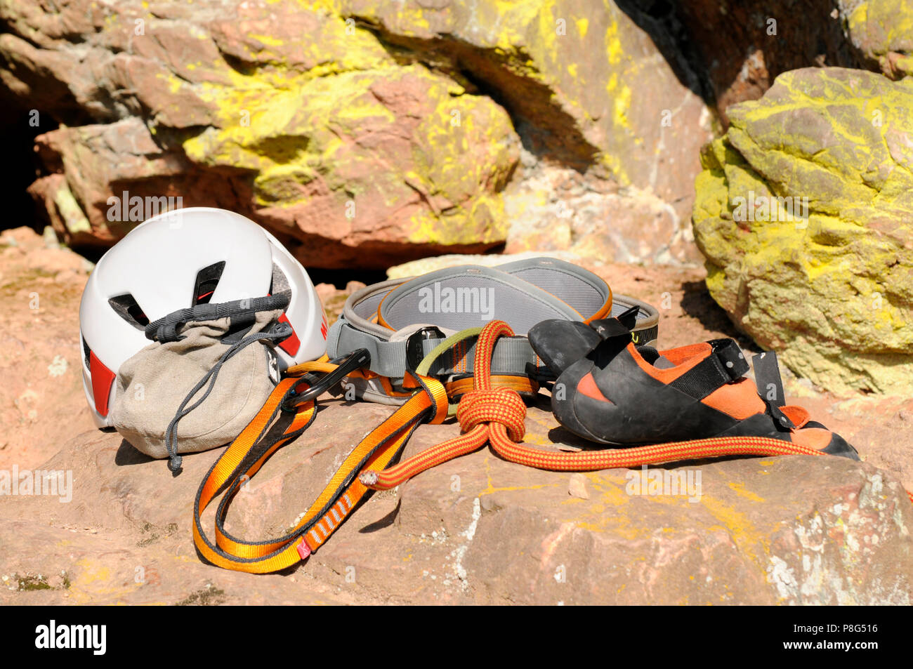 Climbing Equipment, rock climbing, climbing harness, webbing, figure-eight knot, helmet, climber's shoes Stock Photo