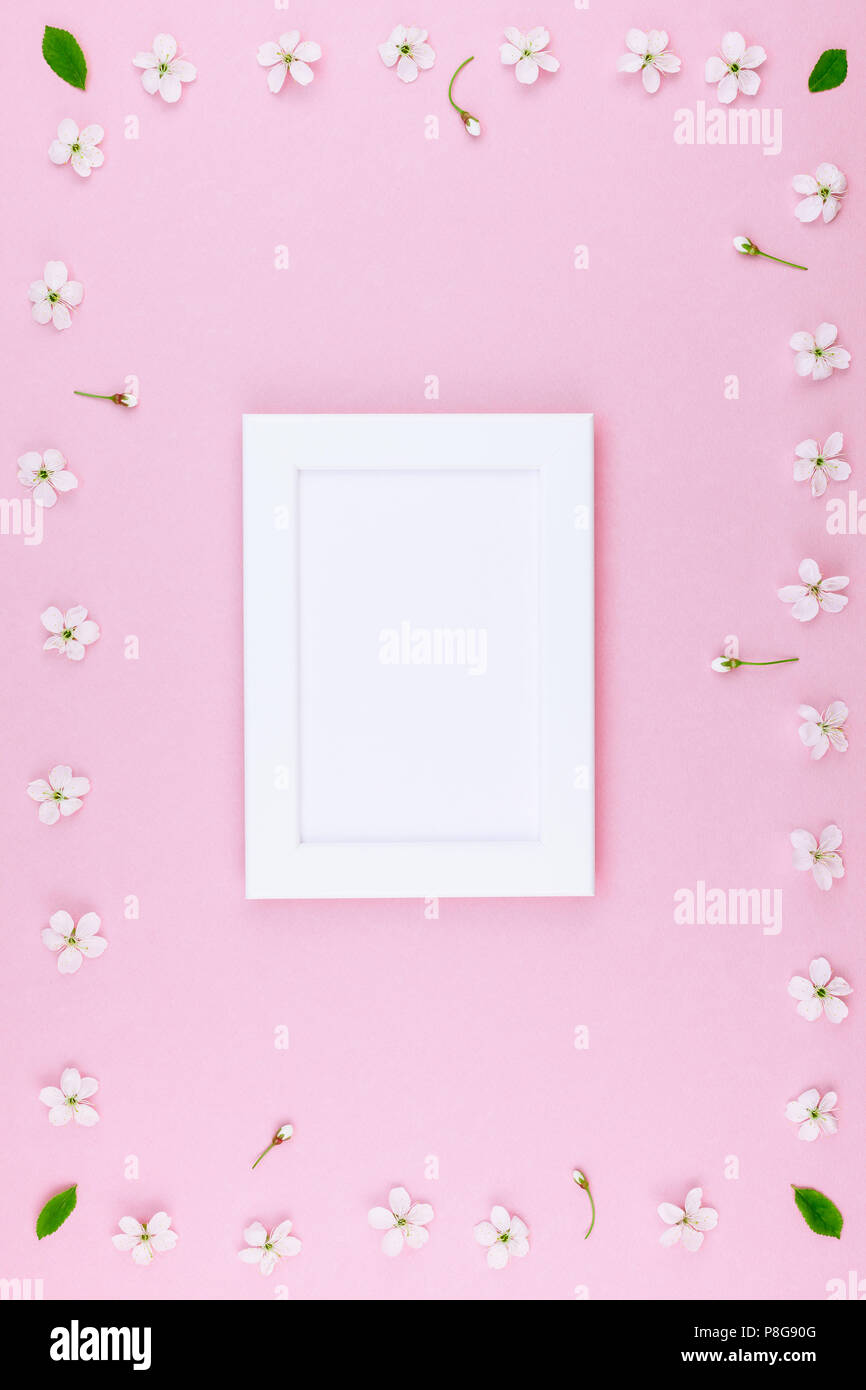 Creative flat lay concept top view of blank frame mock up and cherry ...