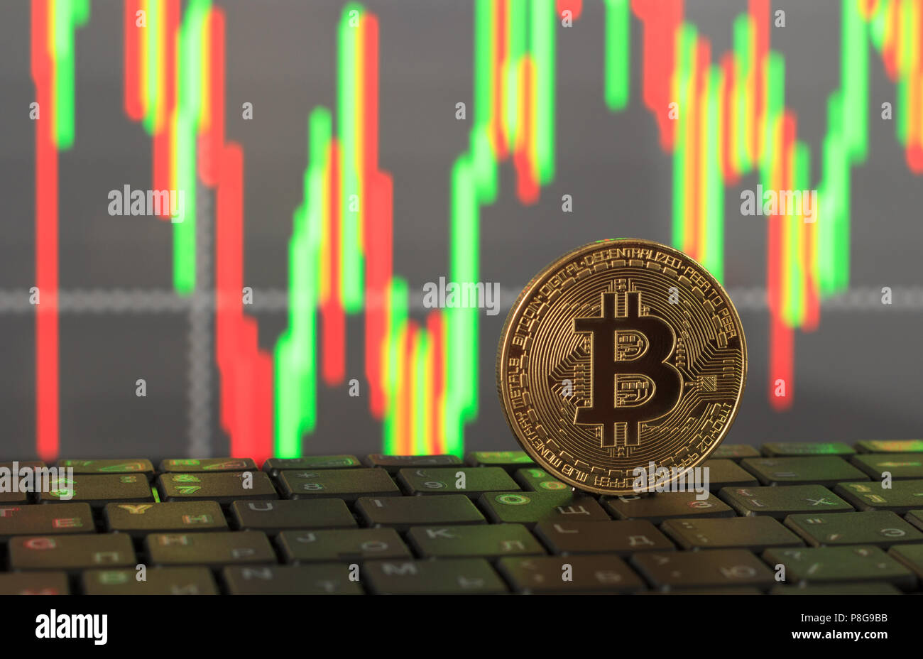 One bitcoin close-up on a blurry background, the concept of rising and ...