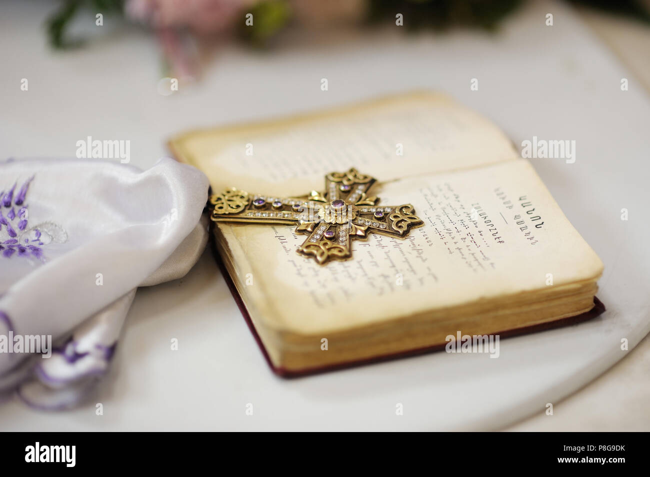 Golden cross with gemstones on Holy Bible Stock Photo Alamy