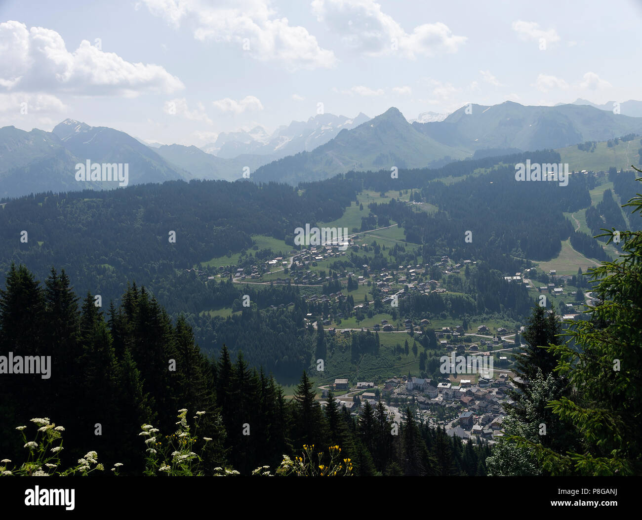 Beautiful View of Les Gets with the Tall Peaks of the French Alps in the Background Haute-Savoie Portes du Soleil France Stock Photo