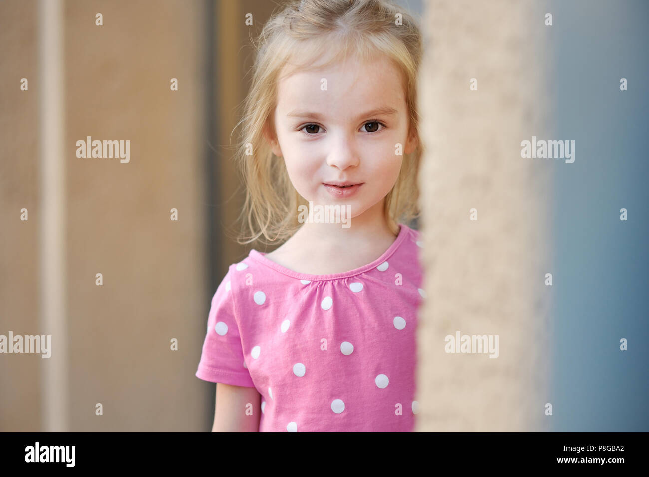 Adorable little girl portrait outdoors at summer Stock Photo - Alamy