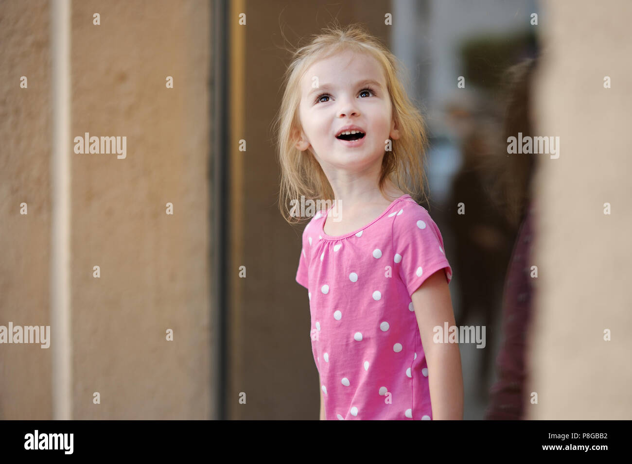 Adorable little girl portrait outdoors at summer Stock Photo - Alamy