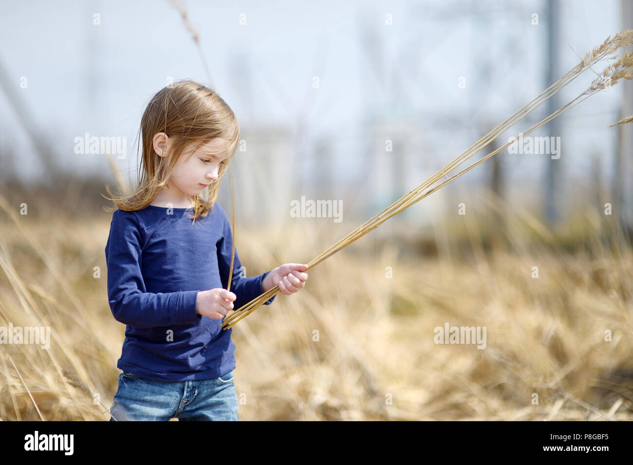 Adorable little girl portrait outdoors at summer Stock Photo - Alamy