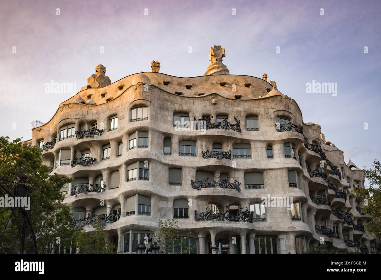 Waves And Sculptural Building Details Of La Pedrera Casa Mila In Barcelona Spain Ornate Architecture View From Below At Sunset Vibrant Colours Stock Photo Alamy
