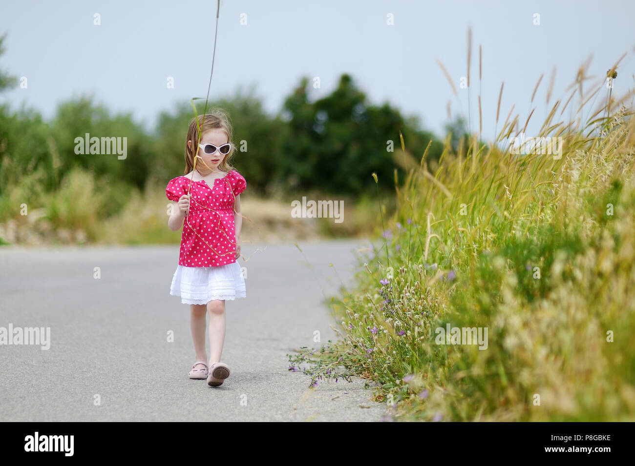 Adorable little girl portrait outdoors Stock Photo - Alamy