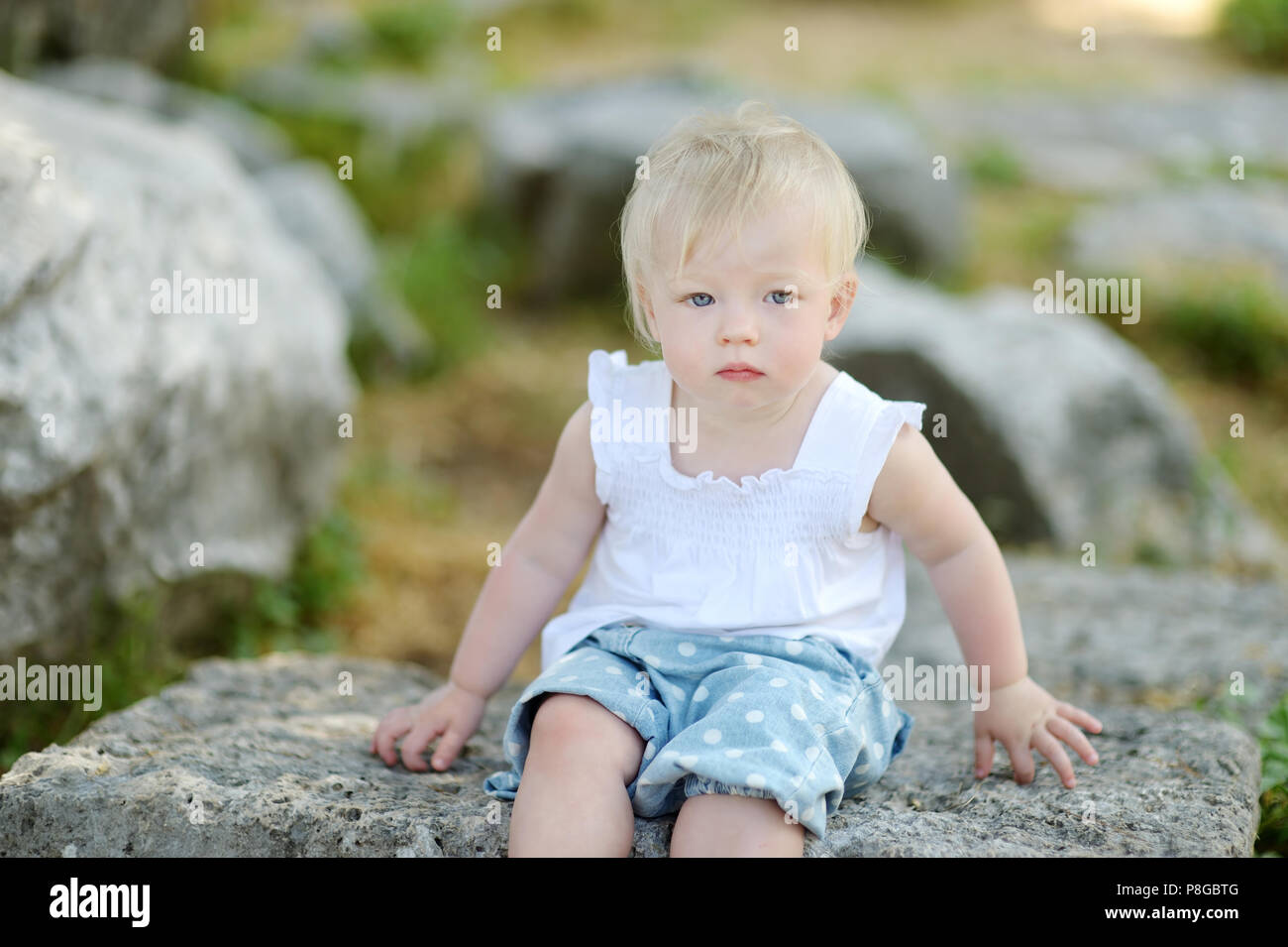 Adorable little girl portrait outdoors Stock Photo - Alamy