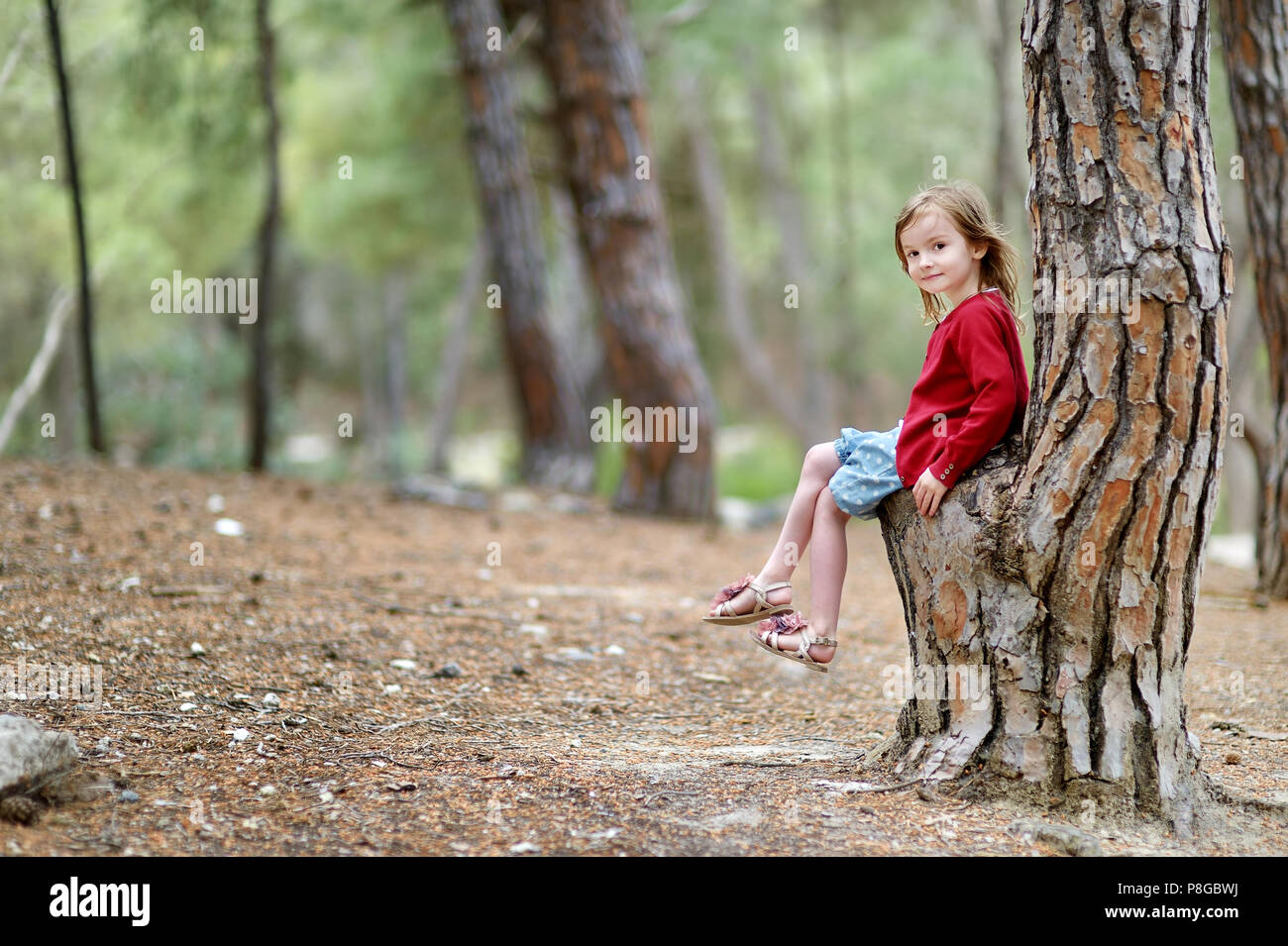 Adorable little girl portrait outdoors Stock Photo - Alamy