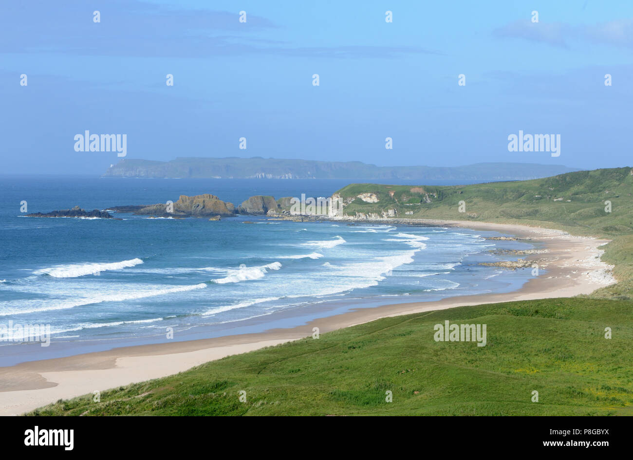 White Park Bay and the sand dunes behind it. Bushmills, County Antrim, Northern Ireland, UK. Stock Photo