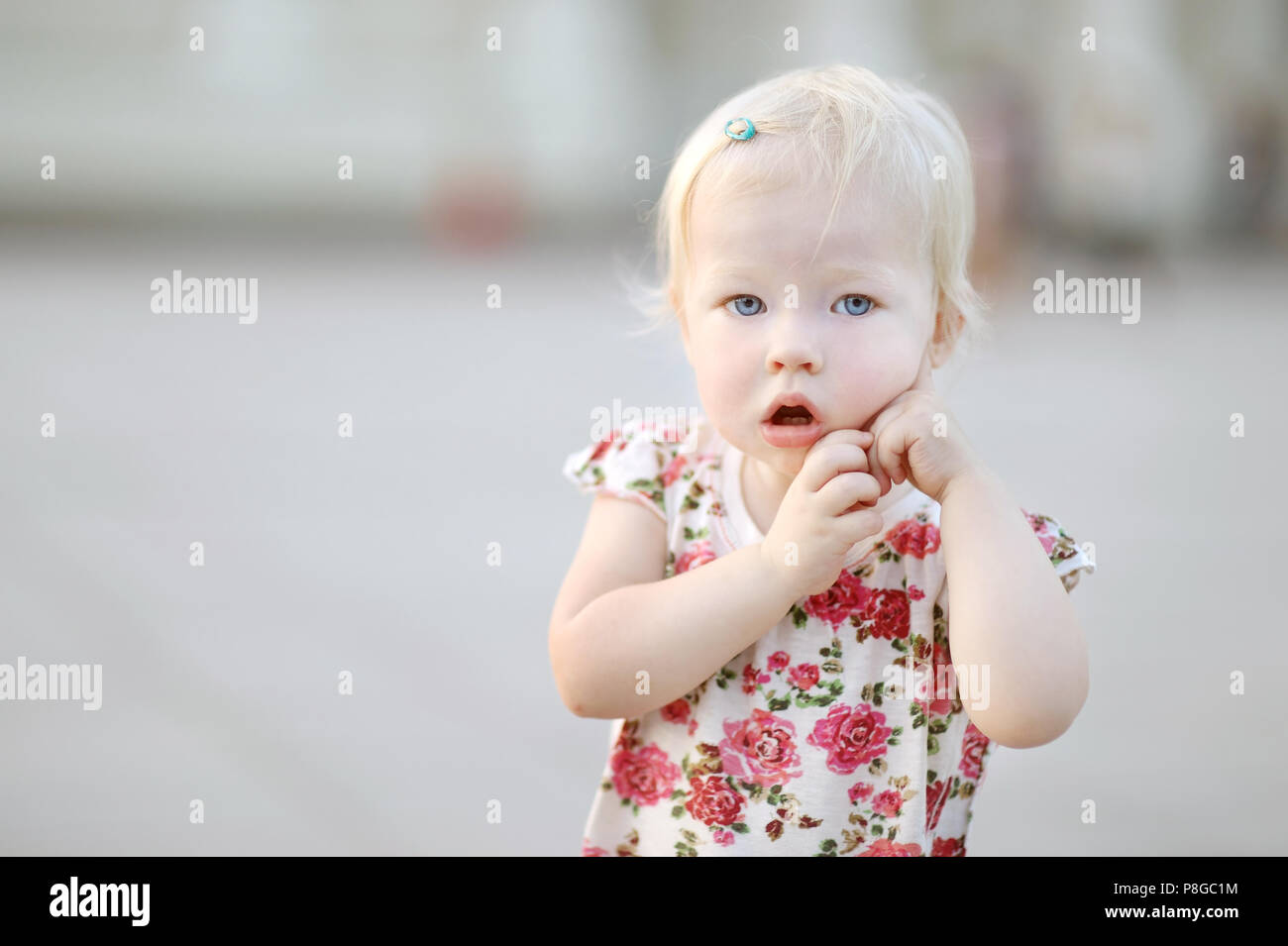 Adorable little girl portrait outdoors Stock Photo - Alamy