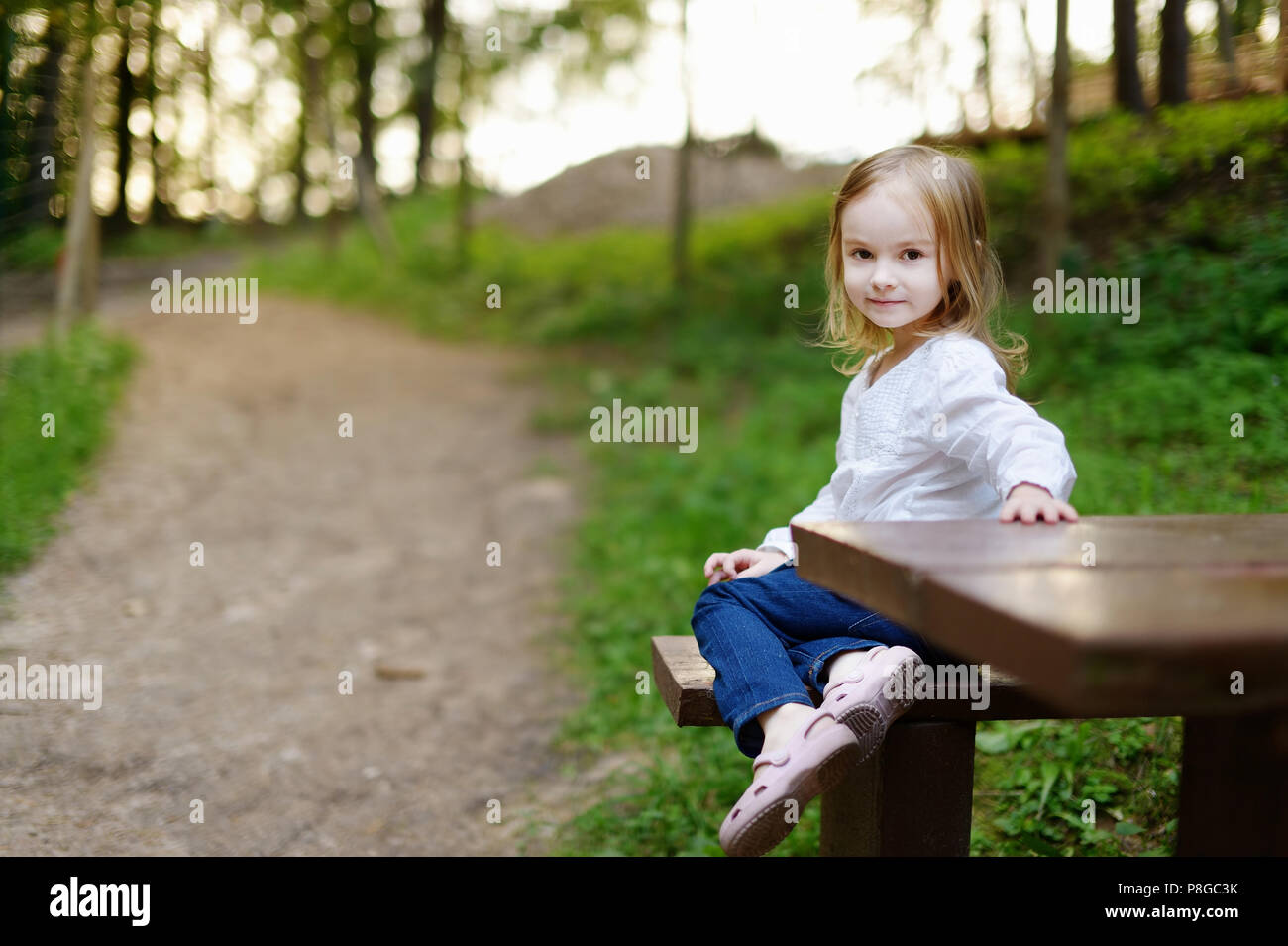 Adorable little girl portrait outdoors Stock Photo - Alamy
