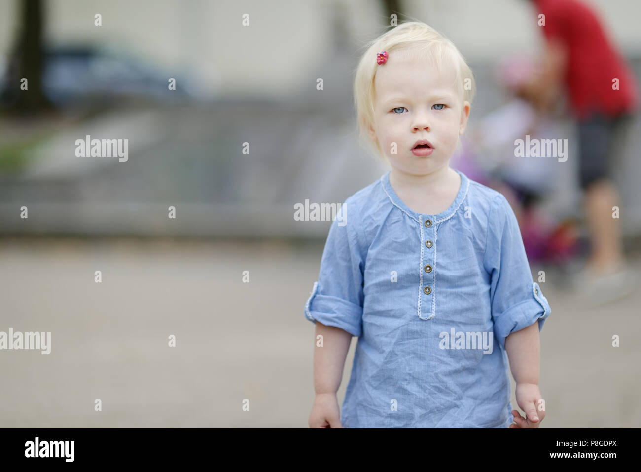 Adorable little girl portrait outdoors at summer Stock Photo - Alamy