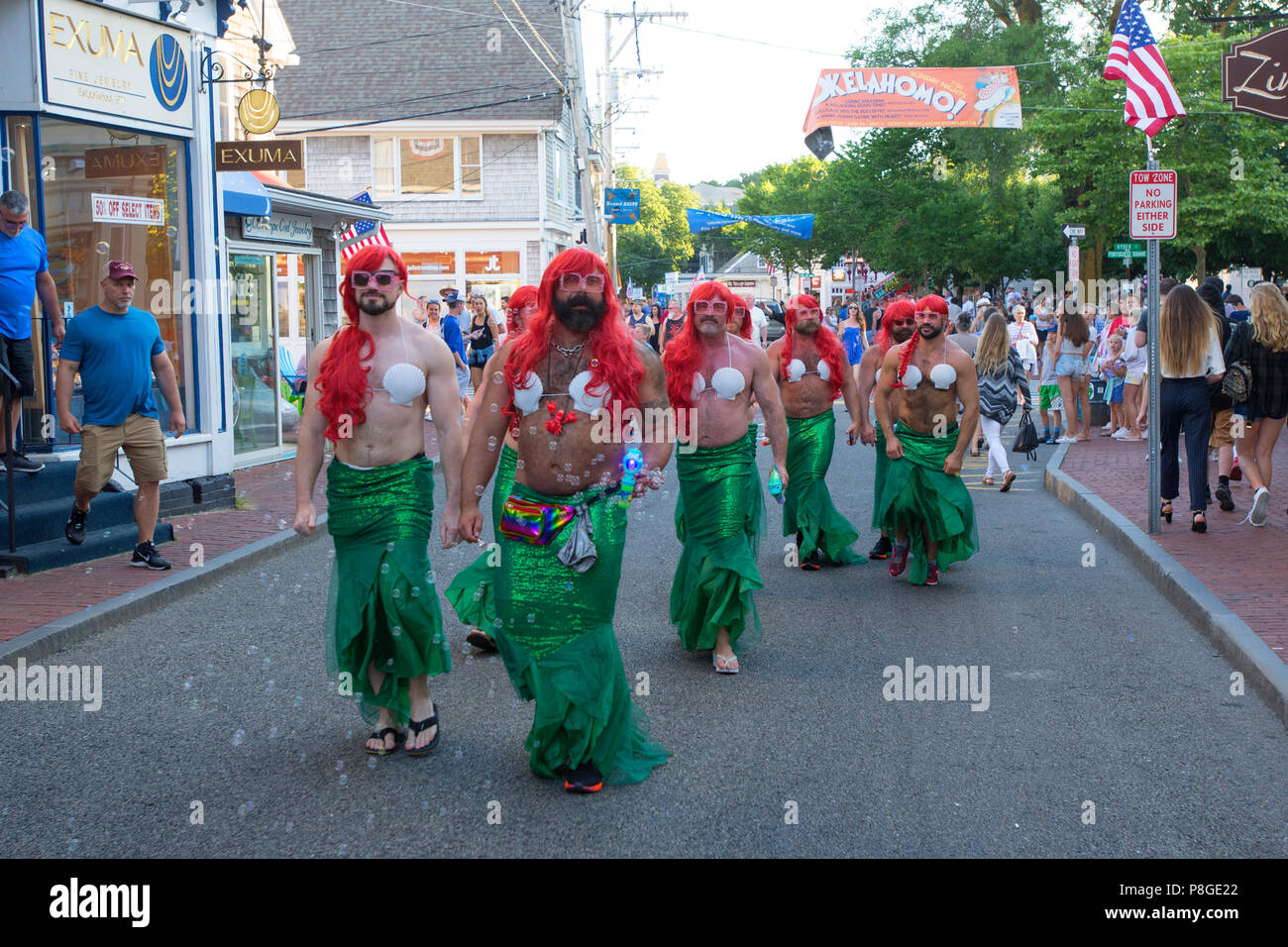 Mermaids stroll along Commercial Street in downtown Provincetown, Massachusetts, USA Stock Photo