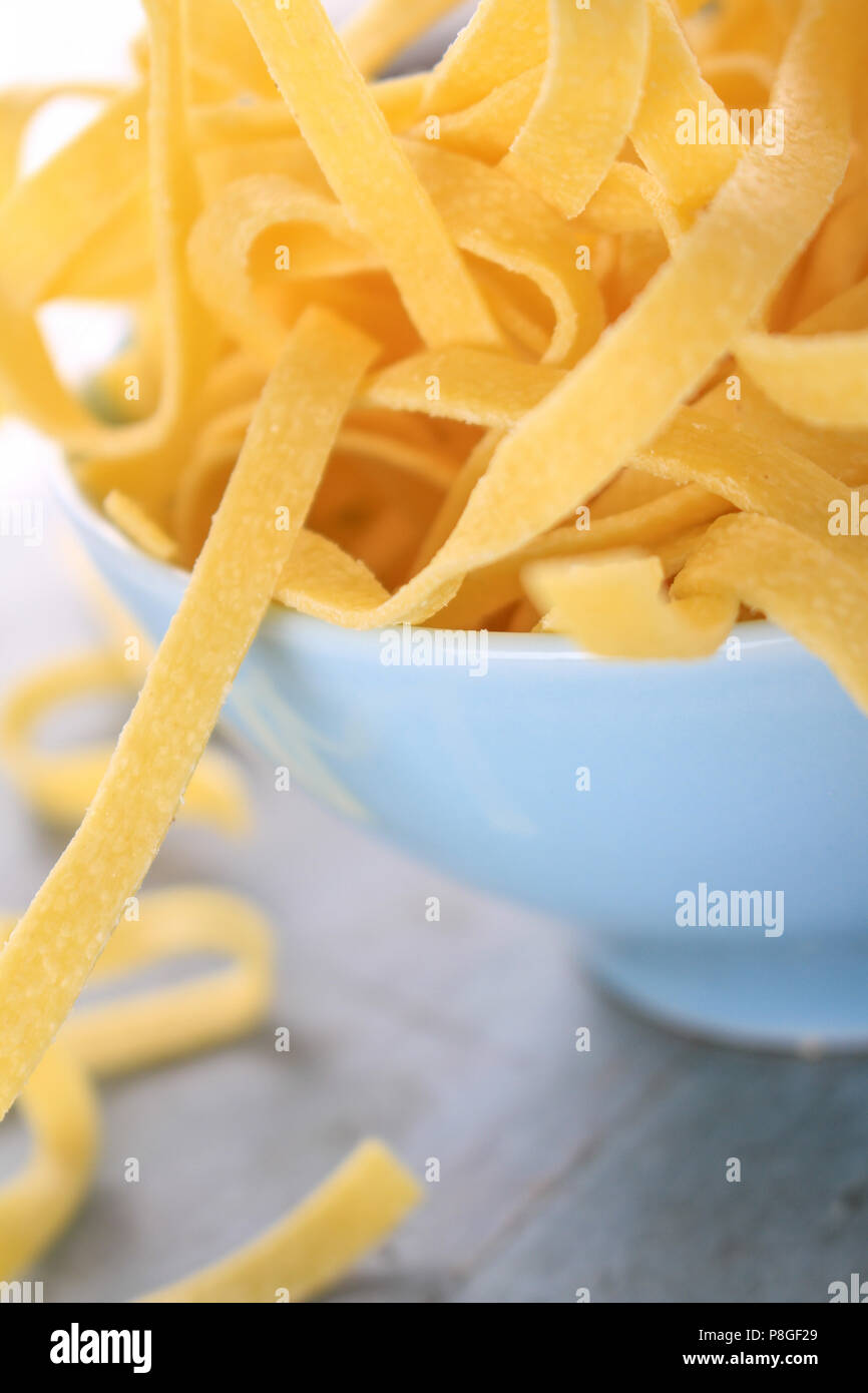 dried Italian tagliatelle pasta Stock Photo - Alamy