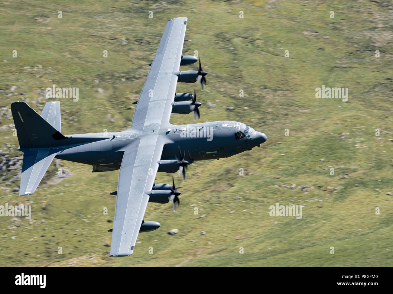 A Hercules C-130 Passing Through the Mach Loop In July 2018 Stock Photo