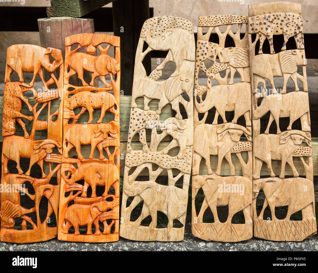 African tribal art of the big five animals of South Africa, for sale at a market stall. This artwork is generic and widely available across markets in Stock Photo