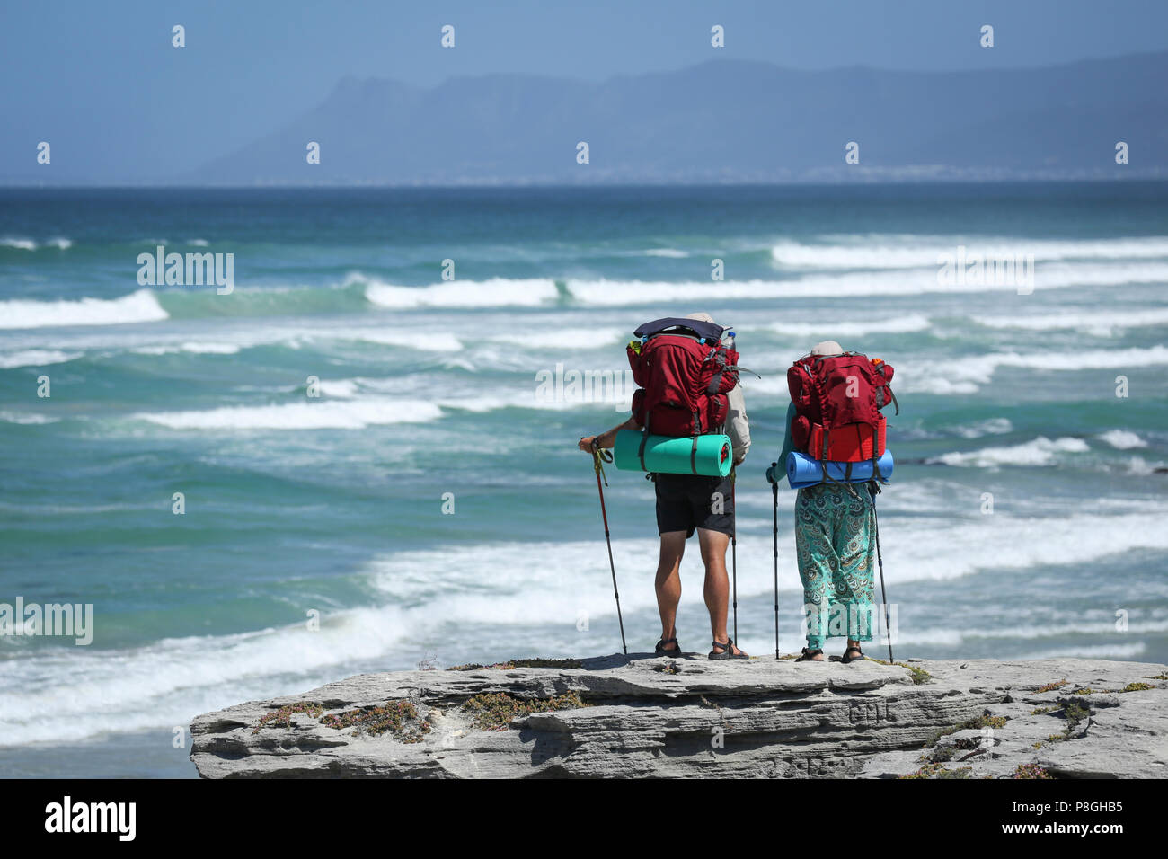 Two hikers mountains enjoying view hi-res stock photography and images ...