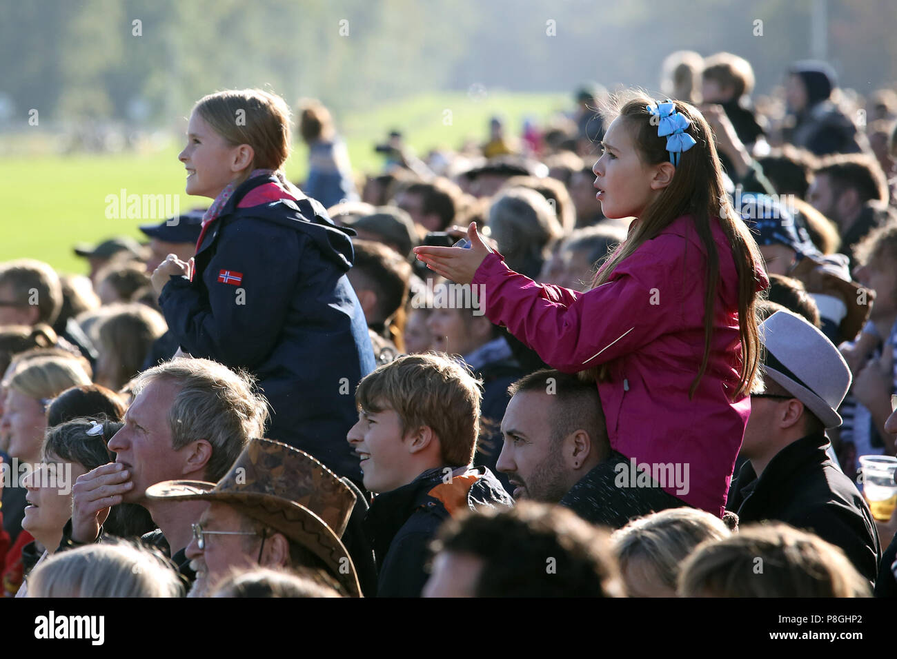 Hoppegarten, Germany, young girls feverish at the gallop race Stock Photo
