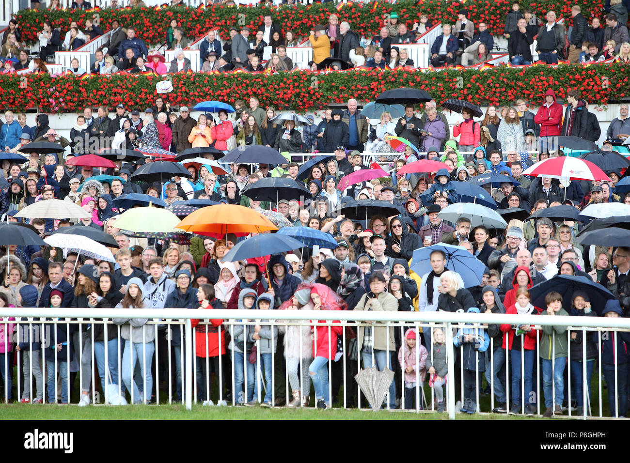 Hoppegarten, Germany, crowd in rainy weather Stock Photo