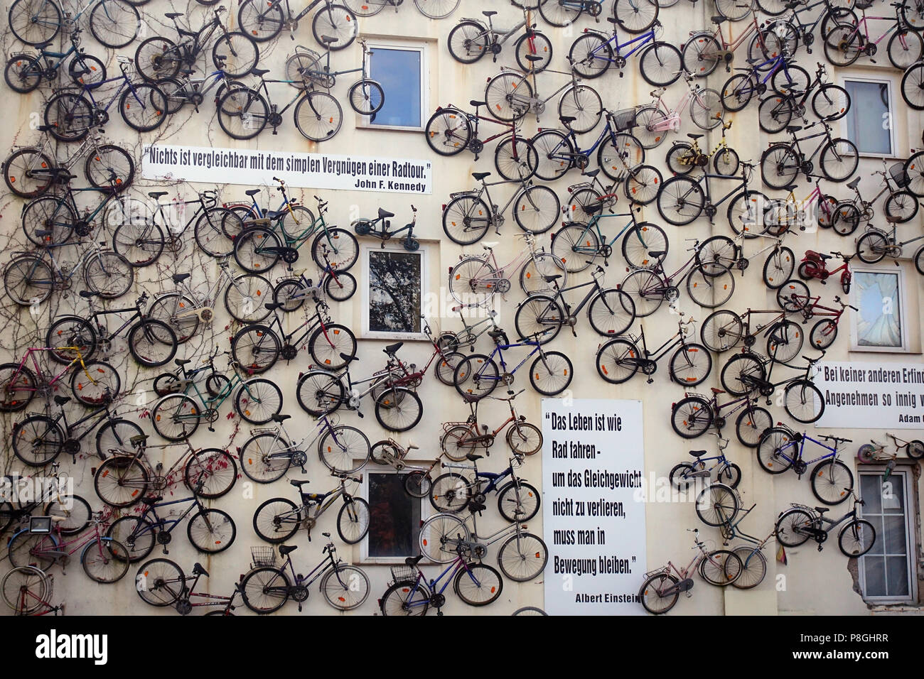 Altlandsberg, Germany, bicycles hang on a house facade Stock Photo