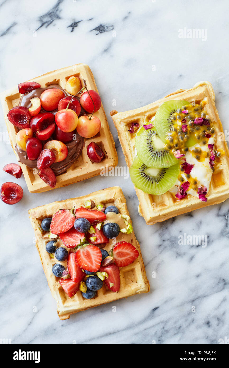 Sweet Belgian Waffles with Fruit toppings Stock Photo Alamy