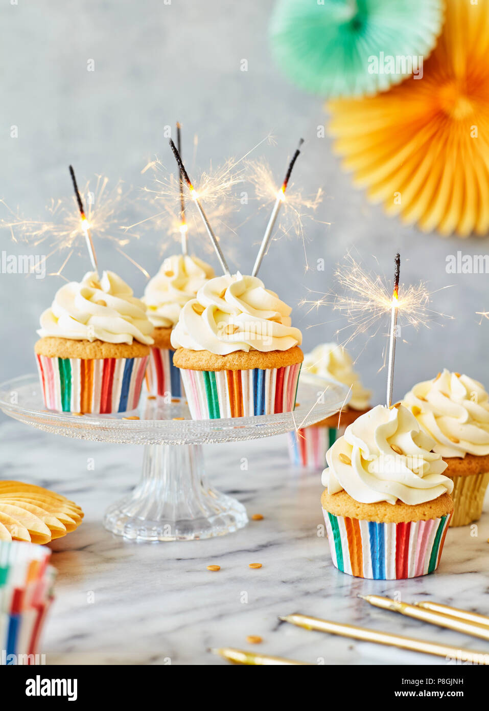 Party cupcakes with sparklers Stock Photo