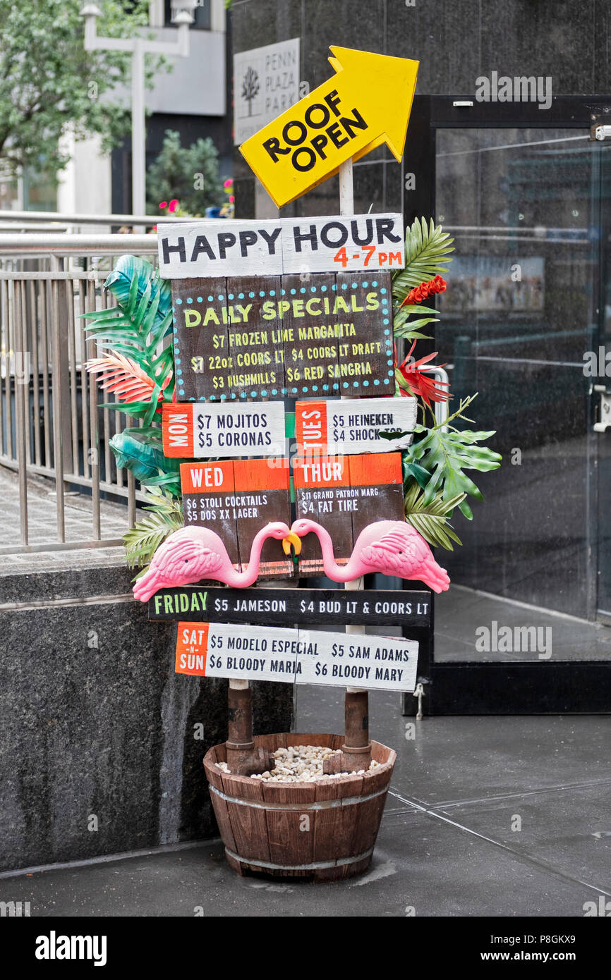 A quirky tropical themed sign advertising for Lucy's Cantina Royale, a Mexican restaurant at 1 Penn Plaza in Manhattan, New York City. Stock Photo