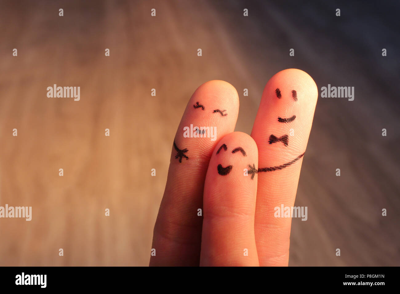 Finger puppet family Stock Photo - Alamy