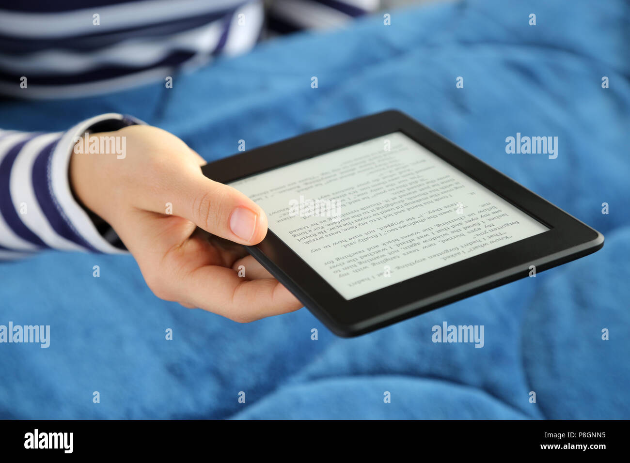 Hand holding electronic book hires stock photography and images Alamy