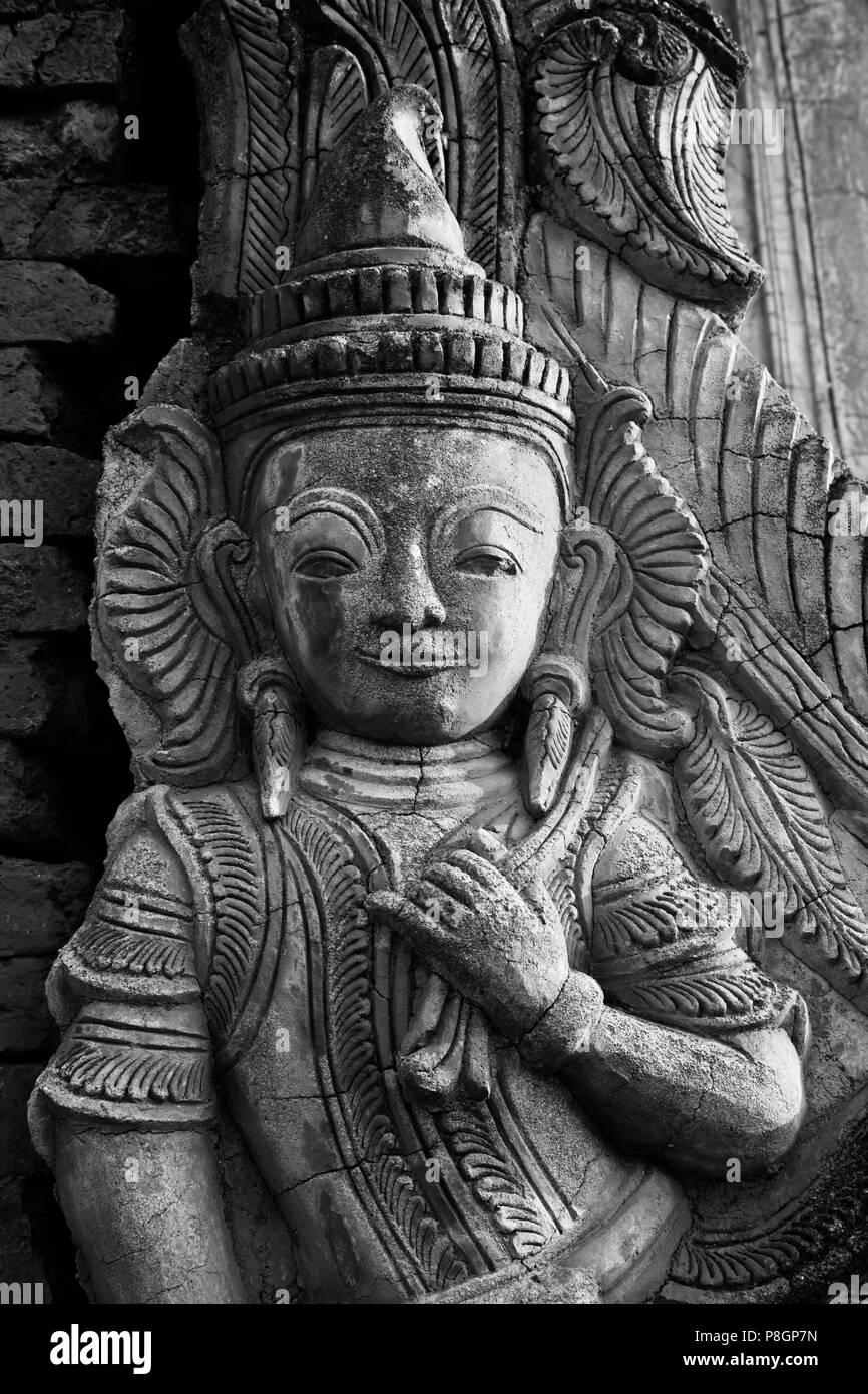 Stucco BUDDHIST DEITIES at NYAUNG OHAK located at INDEIN consisting of ancient SHRINES - INLE LAKE, MYANMAR Stock Photo