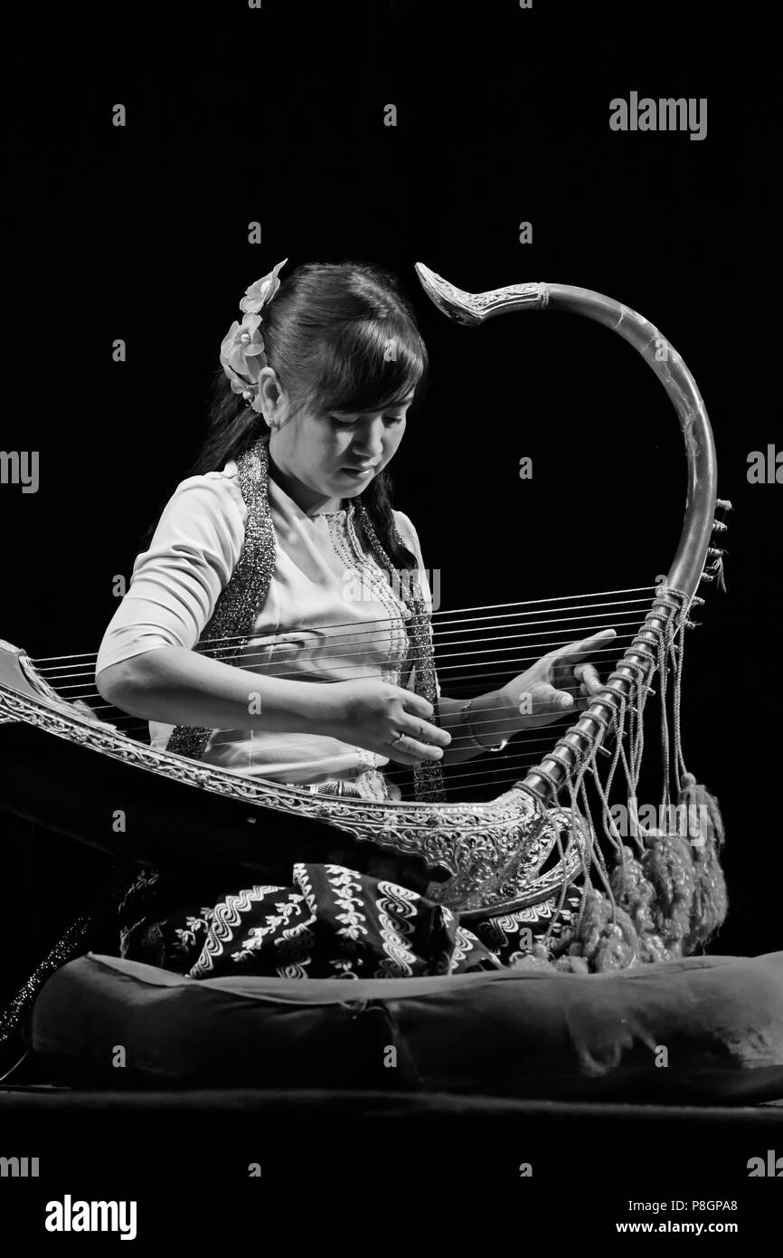 Traditional HARP MUSIC is performed at the MANDALAY THEATER MANDALAY, MYANMAR