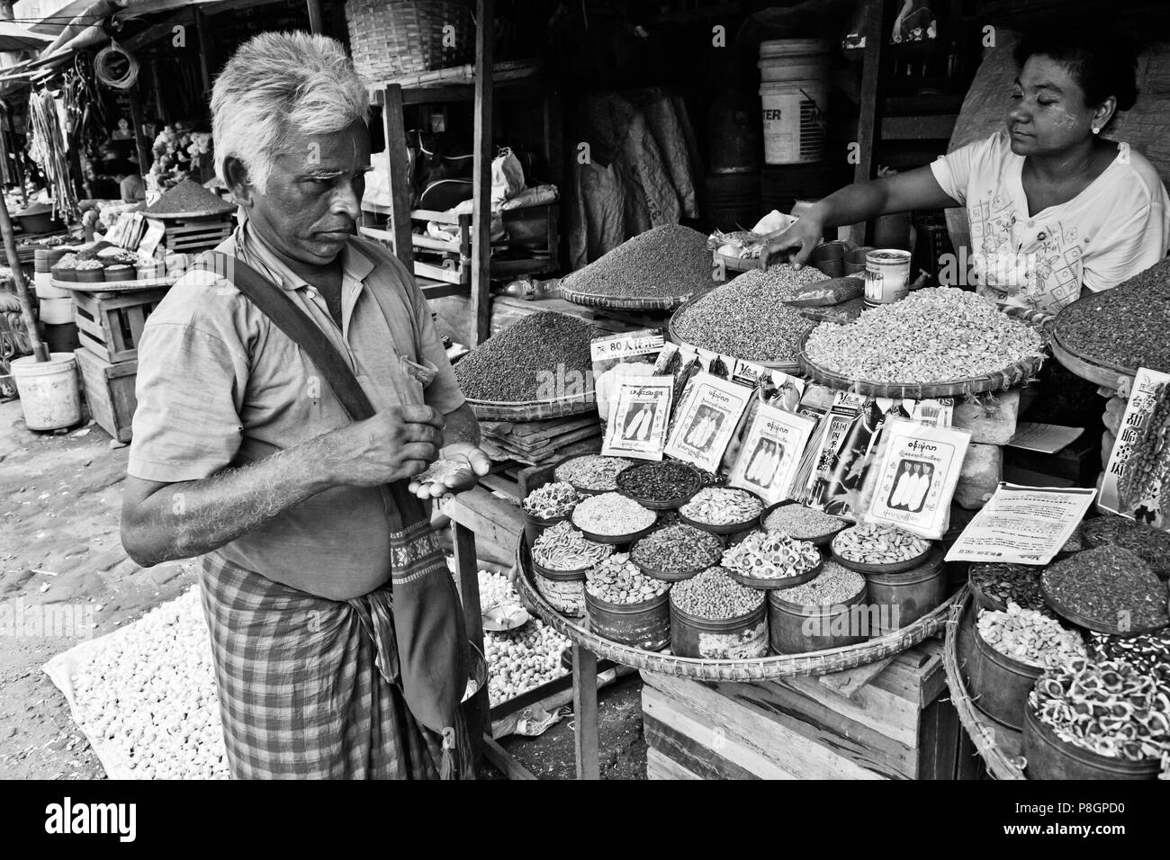 MEDICINAL SPICES and SEEDS for sale at the CENTRAL MARKET in BAGO - MYANMAR Stock Photo