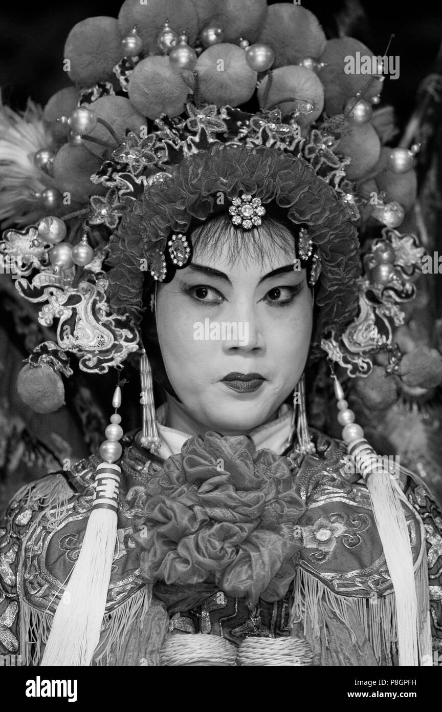 Female star sing in full costume with headdress at the Chinese Opera - Chengdu, China in Sichuan Province Stock Photo