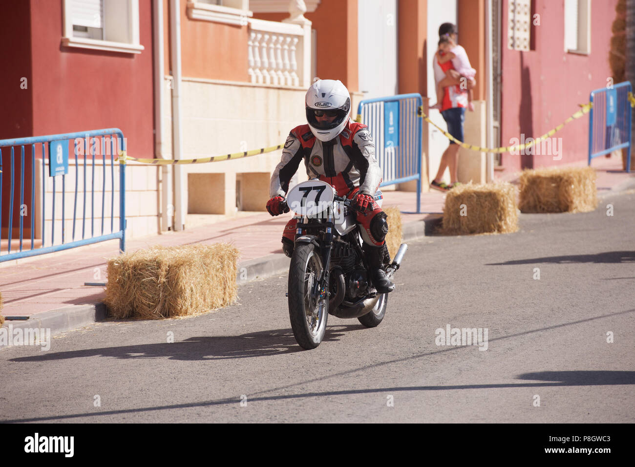 Classic Motorcycle racing in the streets of Alguena, Spain Stock Photo