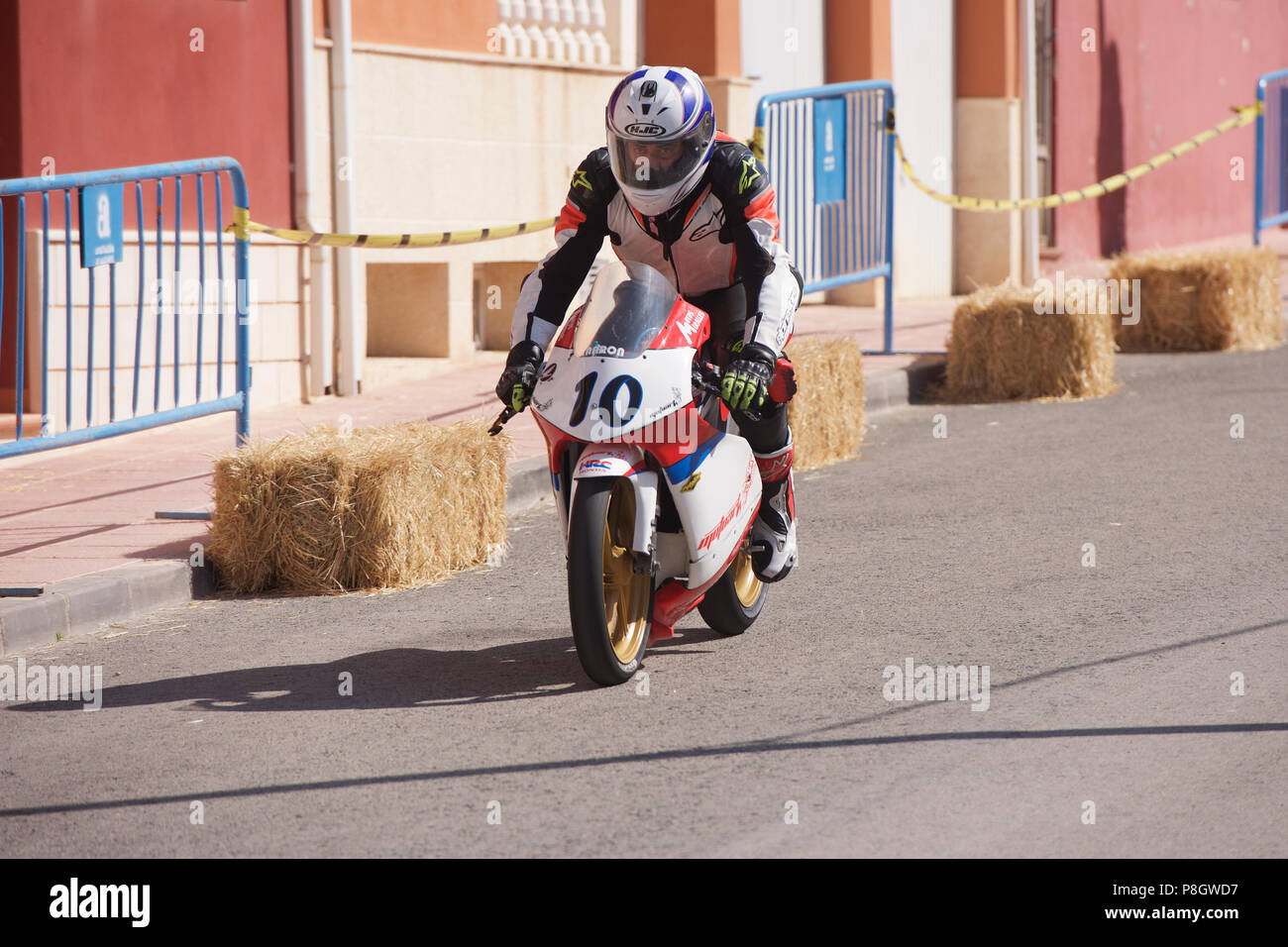 Classic Motorcycle racing in the streets of Alguena, Spain Stock Photo