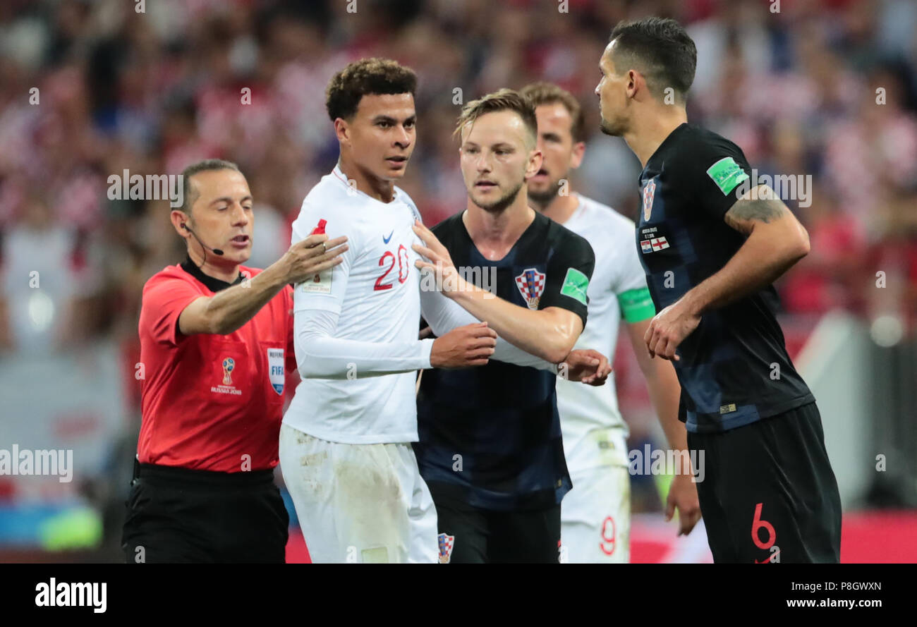 MOSCOW, RUSSIA - JULY 11: (L to R) Referee Cuneyt Cakir, Dele Alli of England, Ivan Rakitic and Dejan Lovren of Croatia during the 2018 FIFA World Cup Russia Semi Final match between England and Croatia at Luzhniki Stadium on July 11, 2018 in Moscow, Russia. MB Media Stock Photo