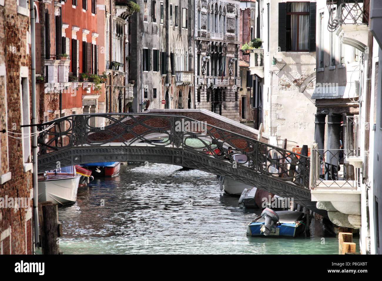 Venice, Italy - boats and old architecture with typical water canal Stock Photo