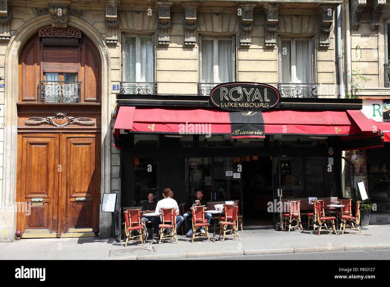 PARIS - JULY 24: Royal Luxembourg cafe on July 24, 2011 in Paris, France. Royal Luxembourg cafe is a typical establishment for Paris, one of largest m Stock Photo