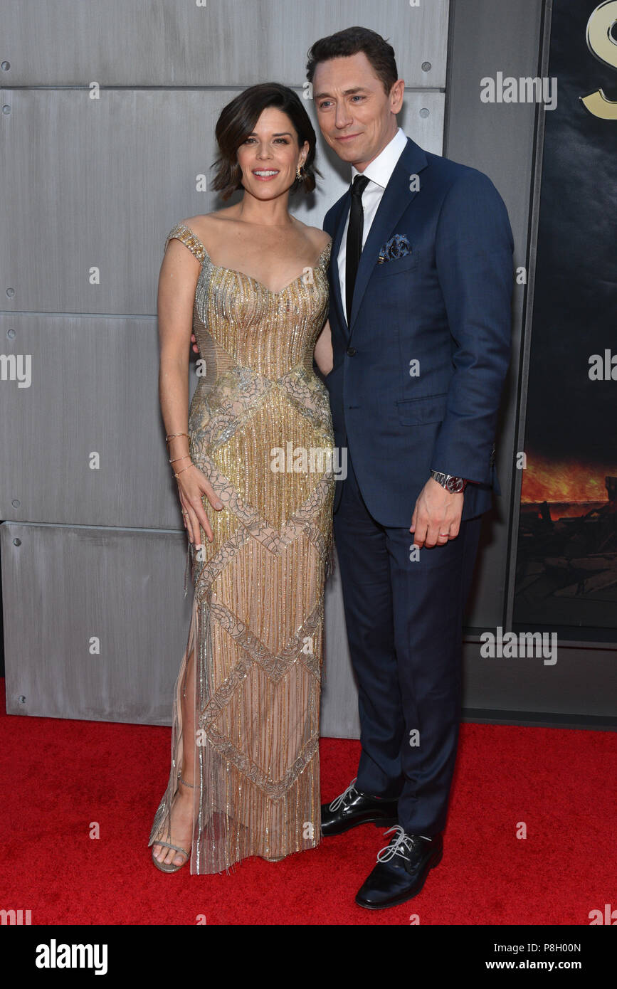 New York, USA. 10th July 2018. Neve Campbell, and JJ Feild attend the 'Skyscraper' New York premiere at AMC Loews Lincoln Square on July 10, 2018 in New York City. Credit: Erik Pendzich/Alamy Live News Stock Photo