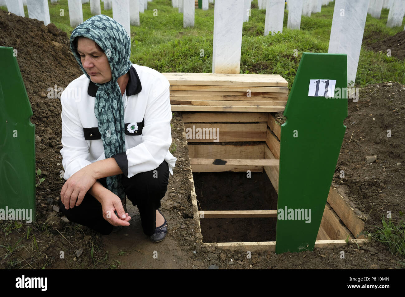 Srebrenica, Srebrenica, Bosnia. 12th Oct, 2017. Europe, Bosnia, Srebrenica, July 11, 2018.Twenty-three years have passed since the Srebrenica Genocide took the lives of more than 7000 victims in Bosnia and Herzegovina between 1992 and 1995. This horrific event is commemorated annually on July 11 because on that day in 1995 Bosnian Serb forces, commanded by convicted war criminal General Ratko Mladic, executed more than 7000 Muslim-Bosniak men, boys and elderly who had sought safety in the region after the fall of Srebrenica. Furthermore, another 25,000 people were forcibly deported in an U Stock Photo