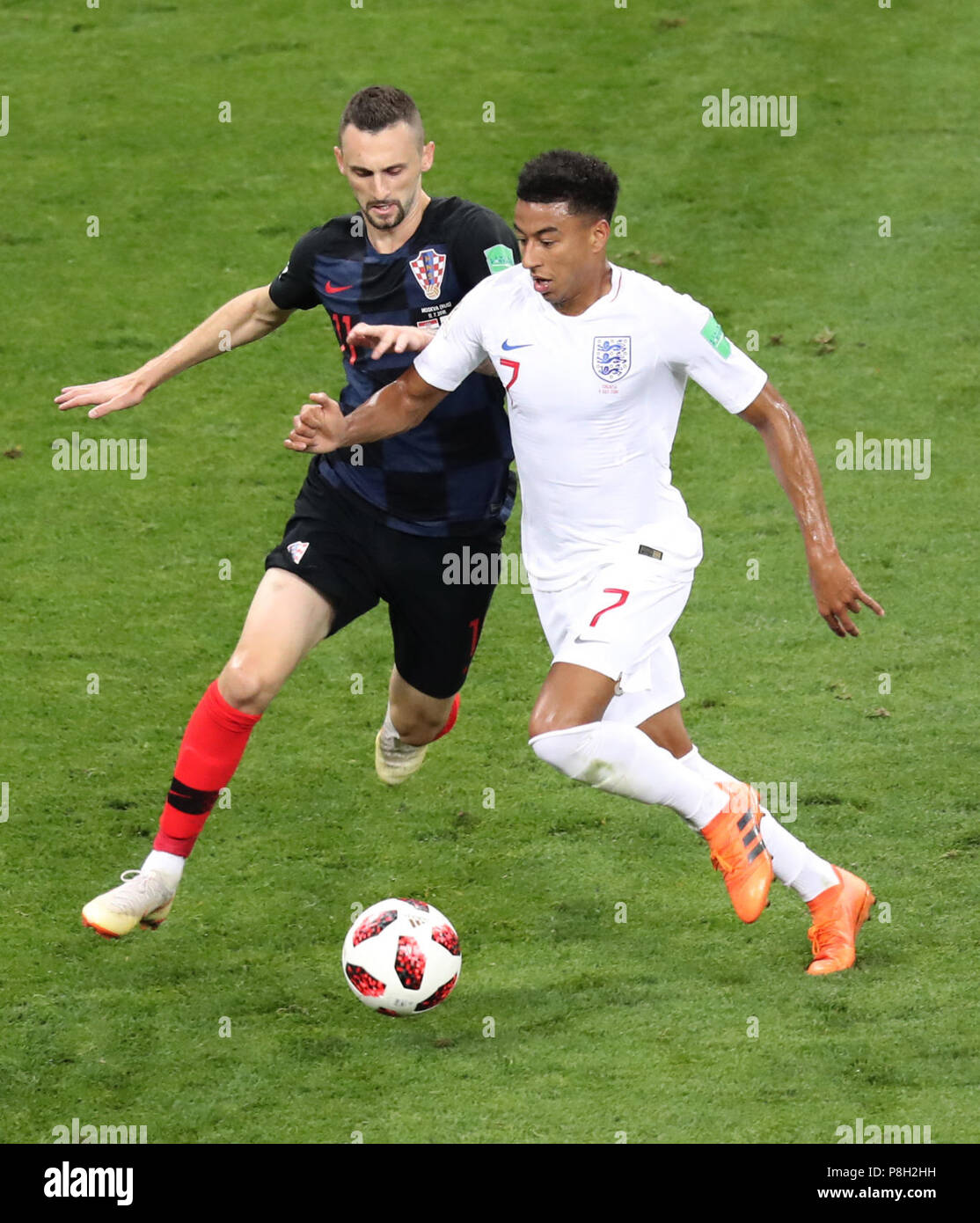 Moscow, Russia. 11th July, 2018. Jesse Lingard (R) of England vies with Marcelo Brozovic of Croatia during the 2018 FIFA World Cup semi-final match between England and Croatia in Moscow, Russia, July 11, 2018. Credit: Bai Xueqi/Xinhua/Alamy Live News Stock Photo