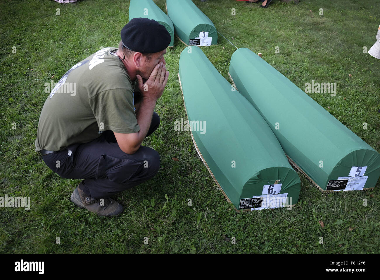 July 10, 2018 - Srebrenica, Bosnia - Twenty-three years have passed since the Srebrenica Genocide took the lives of more than 7000 victims in Bosnia and Herzegovina between 1992 and 1995. This horrific event is commemorated annually on July 10 because on that day in 1995 Bosnian Serb forces, commanded by convicted war criminal General R. Mladic, executed more than 7000 Muslim-Bosniak men, boys and elderly who had sought safety in the region after the fall of Srebrenica. Furthermore, another 25,000 people were forcibly deported in an UN-assisted ethnic cleansing that was later referred to by th Stock Photo
