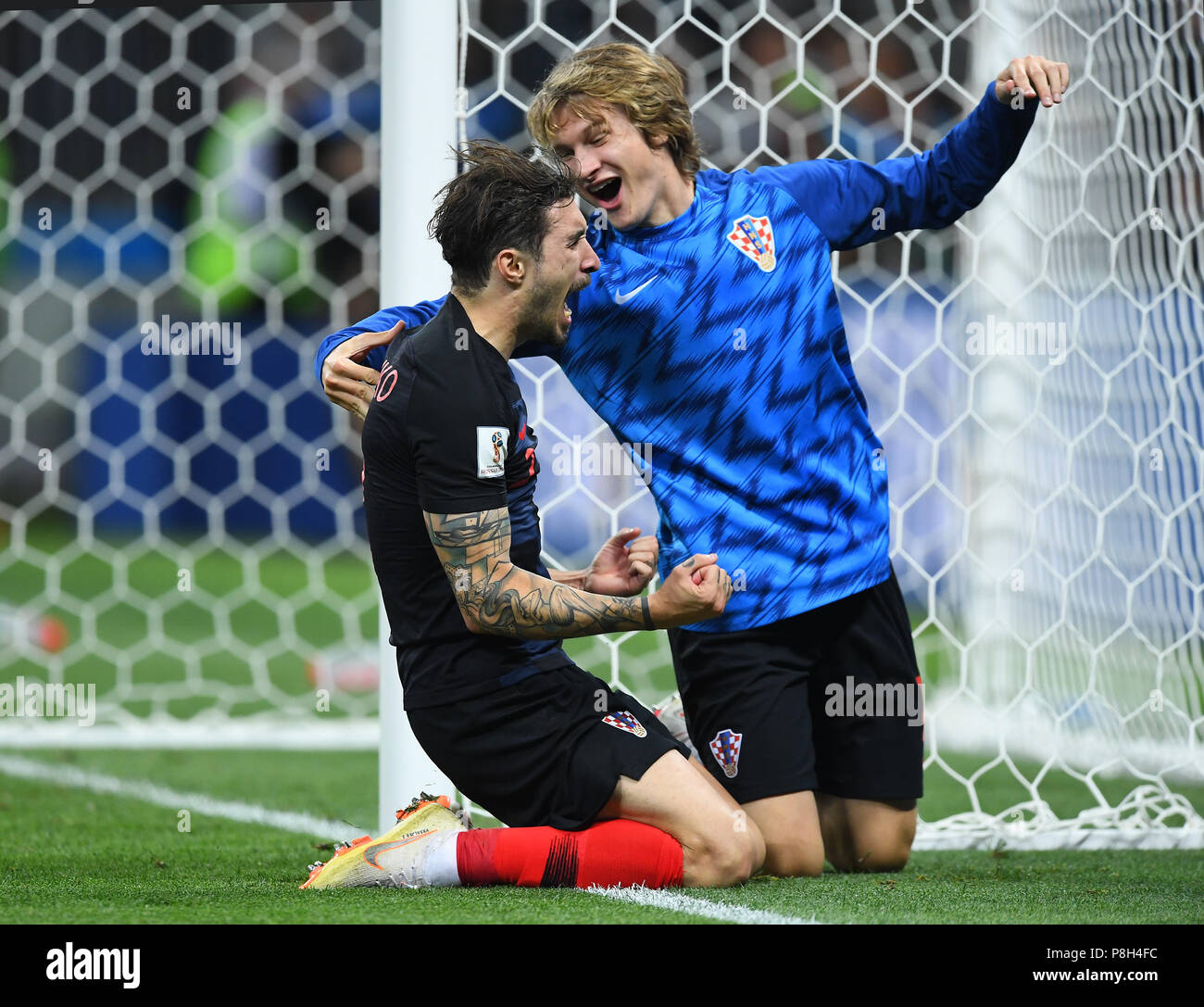Moscow, Russia. 11th July, 2018. Moscow, Russia. 11th July, 2018. Croatia's Sime Vrsaljko and Tin Jedvaj cheer after the final whistle GES/Football/World Cup 2018 Russia: Semi-finals: Croatia - England, 11.07.2018 GES/Soccer/Football/Worldcup 2018 Russia: semi final: Croatia vs England, Moscow, July 11, 2018 | usage worldwide Credit: dpa/Alamy Live News Credit: dpa picture alliance/Alamy Live News Stock Photo