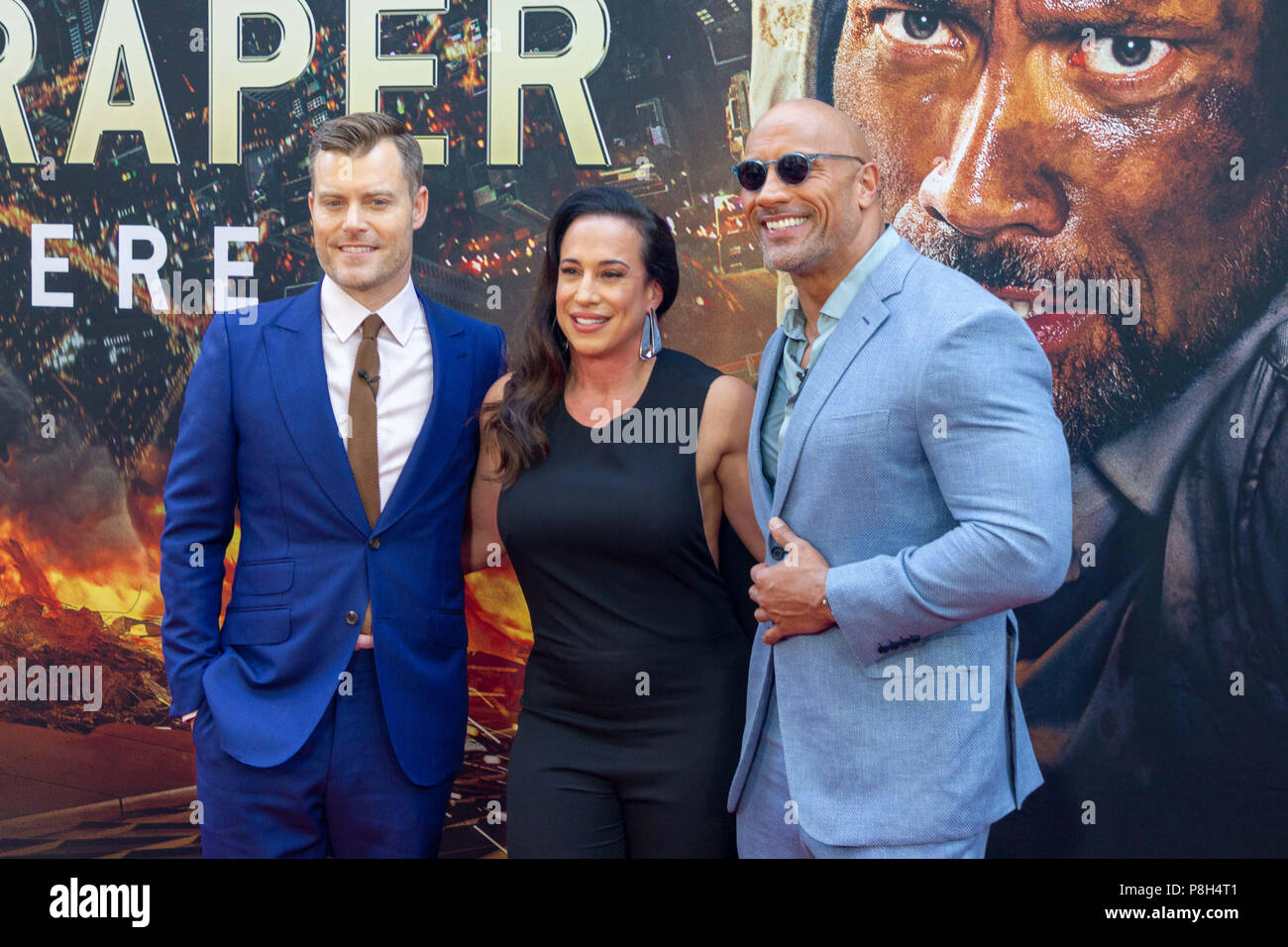 New York, USA. 10th July, 2018. Director Rawson Marshall Thurber, executive producer Dany Garcia, and actor Dwayne Johnson attend the New York premiere of “Skyscraper” on July 10, 2018. Credit: Jeremy Burke/Alamy Live News Stock Photo