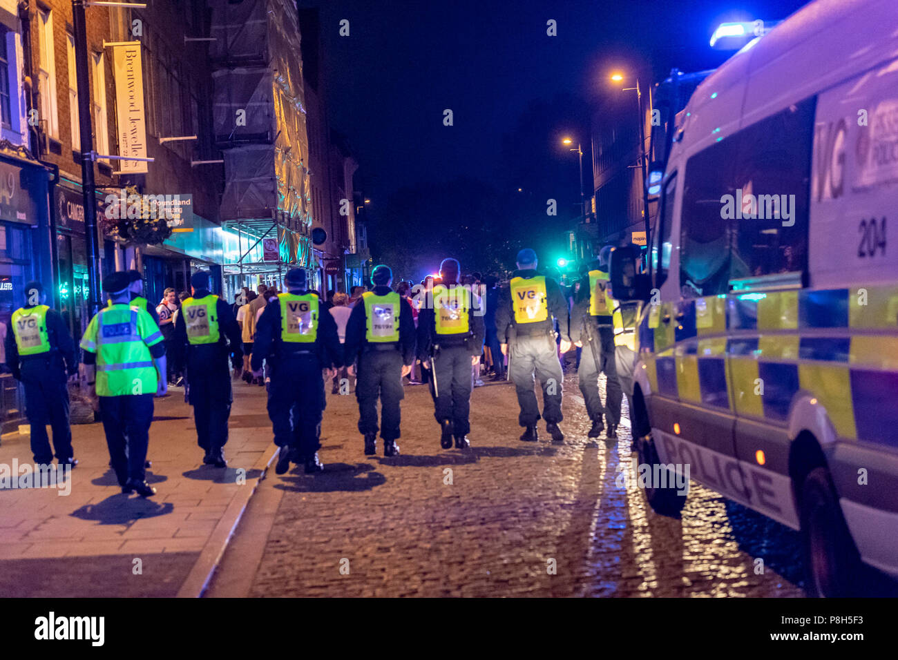 Brentwood Essex11th June 2018 Approximately fifty police officers deployed in Brentwood Essex  following England losing against Croatia.  Fans tears turned to disorder and Essex police had to clear fans down the entire length of the High Street.  One small group of fans challenged the police and arrests were made. Credit Ian Davidson/Alamy Live News Stock Photo