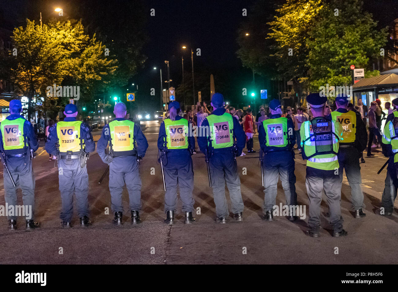 Brentwood Essex 11th June 2018 Approximately fifty police officers deployed in Brentwood Essex  following England losing against Croatia.  Fans tears turned to disorder and Essex police had to clear fans down the entire length of the High Street.  One small group of fans challenged the police and arrests were made. Credit Ian Davidson/Alamy Live News Stock Photo