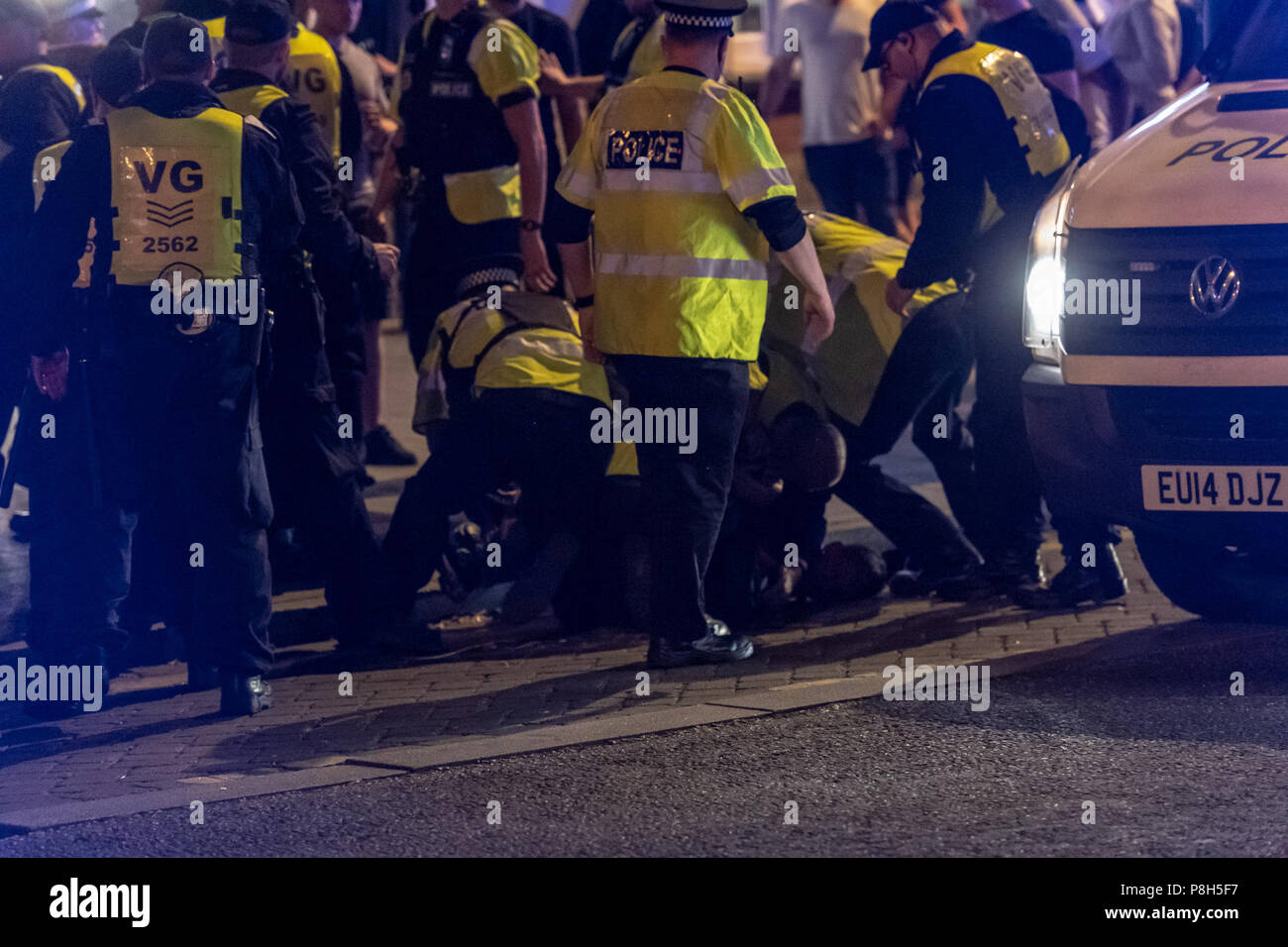 Brentwood Essex11th June 2018 Approximately fifty police officers deployed in Brentwood Essex  following England losing against Croatia.  Fans tears turned to disorder and Essex police had to clear fans down the entire length of the High Street.  One small group of fans challenged the police and arrests were made. Credit Ian Davidson/Alamy Live News Stock Photo