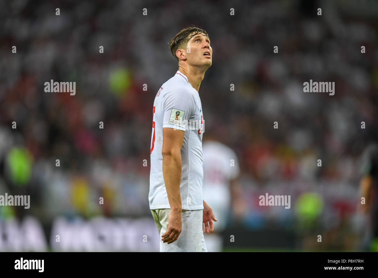 Luzhniki Stadium, Moscow, Russia. 11th July, 2018. FIFA World Cup Football, semi final, Croatia versus England; John Stones of England looking up at the clock as time runs out in extra time Credit: Action Plus Sports/Alamy Live News Stock Photo