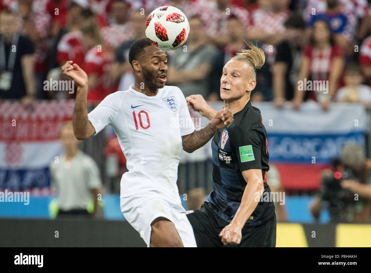 Raheem STERLING (left, ENG) versus Domagoj VIDA (CRO), action, duels, Croatia (CRO) - England (ENG) 2: 1, semi-finals, match 62, on 11.07.2018 in Moscow; Football World Cup 2018 in Russia from 14.06. - 15.07.2018. | Usage worldwide Stock Photo